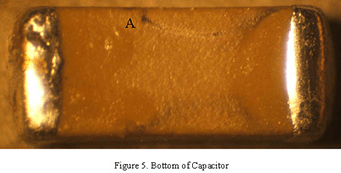 bottom of capacitor